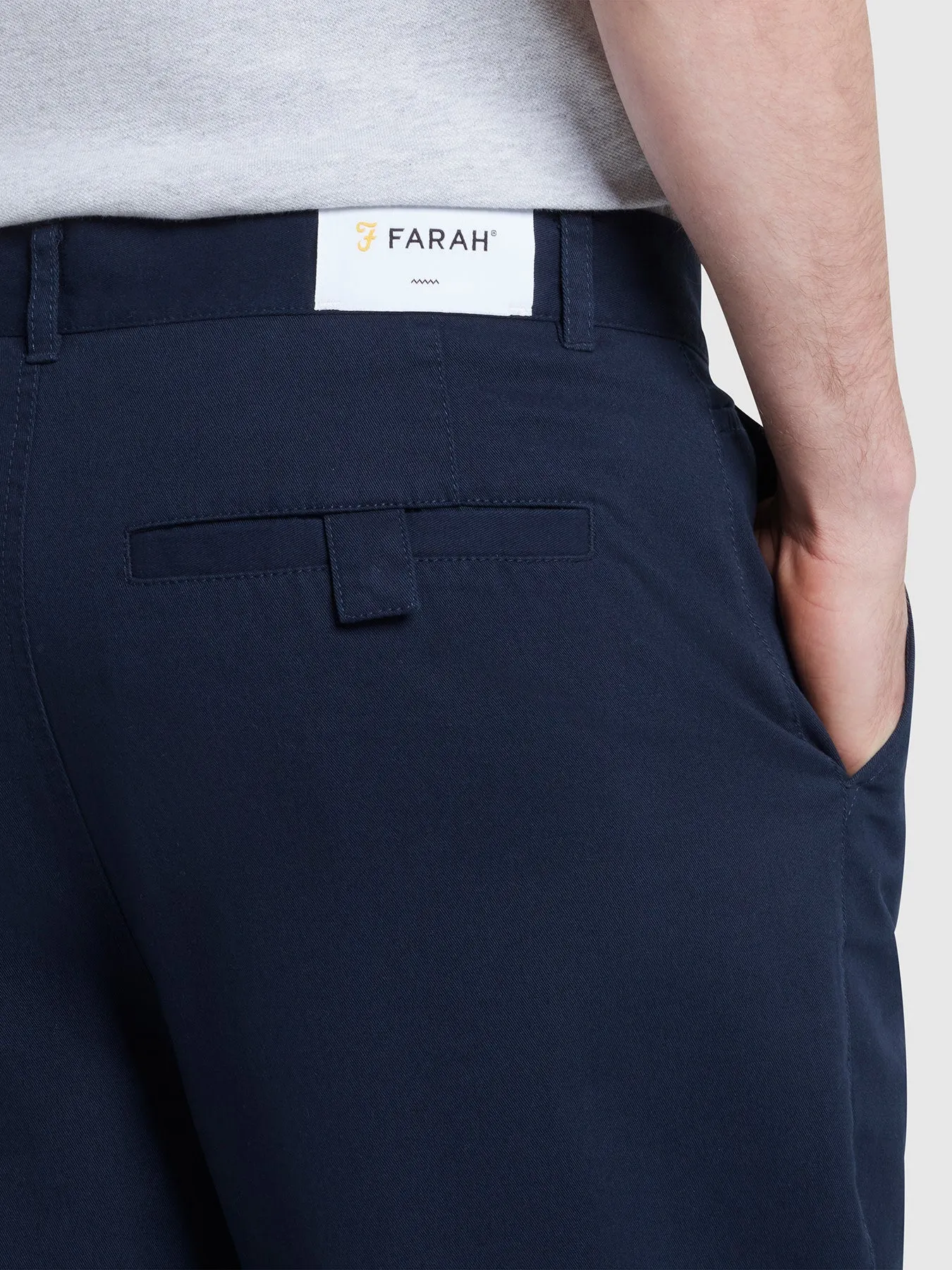 Hawtin Relaxed Tapered Fit Popperback Trousers In True Navy