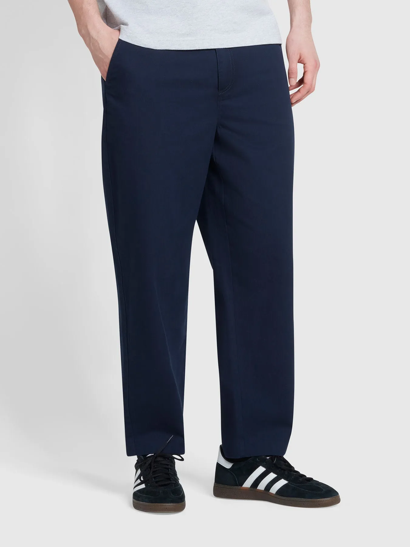 Hawtin Relaxed Tapered Fit Popperback Trousers In True Navy